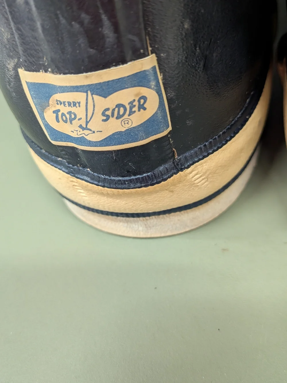 Sperry Top Siders Black Rain & Snow Boots with Cream Trim.